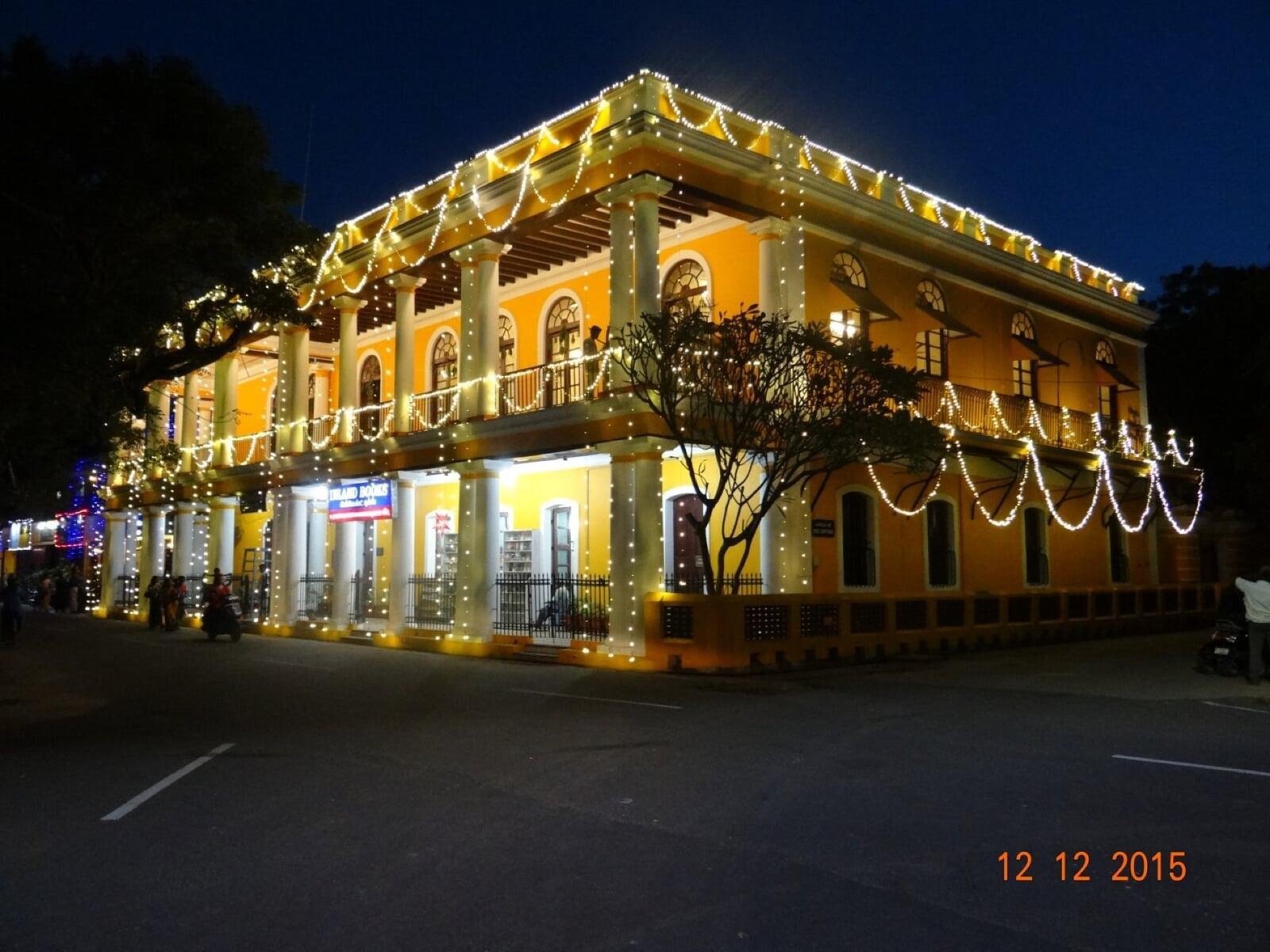 A heritage building restored and lit at night