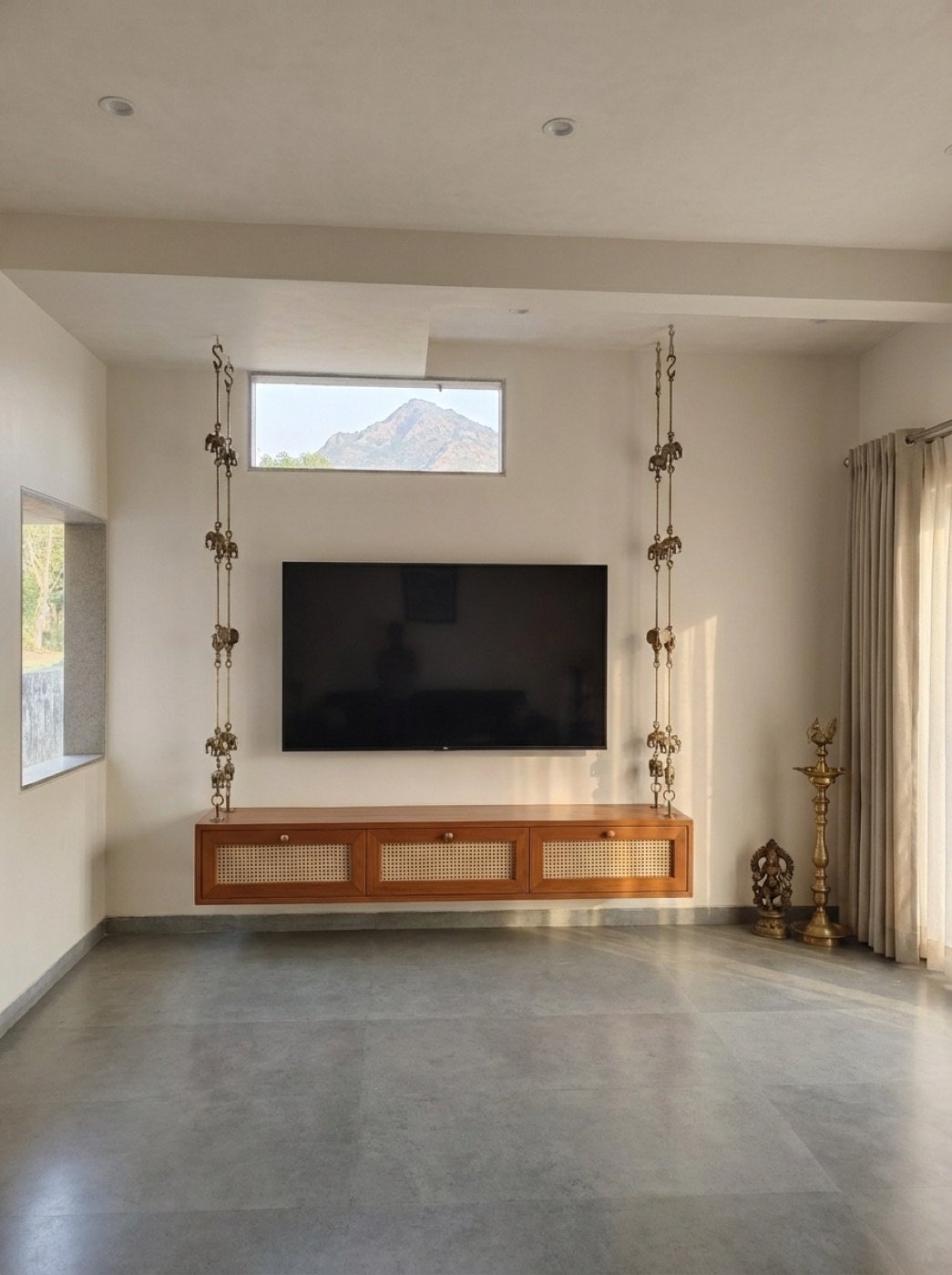 Minimal media console with a clerestory window above
